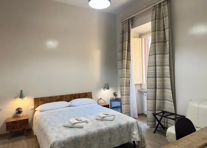 לינה וארוחת בוקר Santi Quattro Al Colosseo 4*