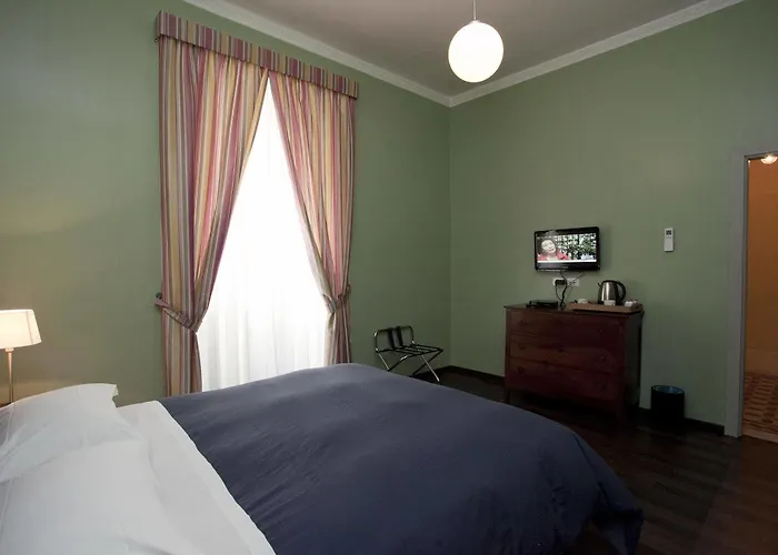 Santi Quattro Al Colosseo לינה וארוחת בוקר 4*